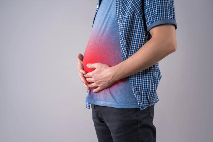 Persona con molestias abdominales